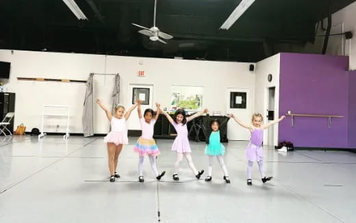 a group of girls dancing