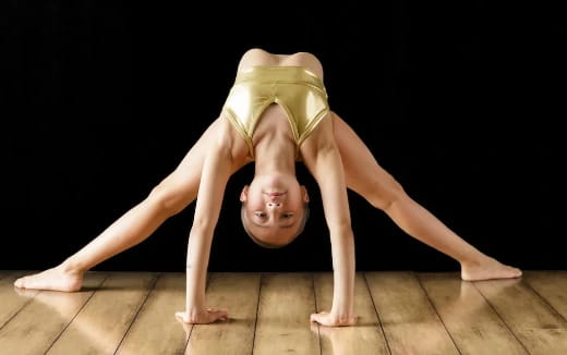 a woman doing a yoga pose