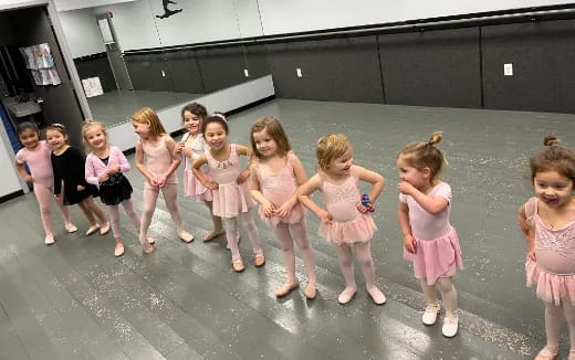 a group of children in dresses