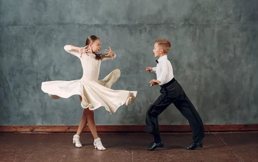 a man and woman dancing