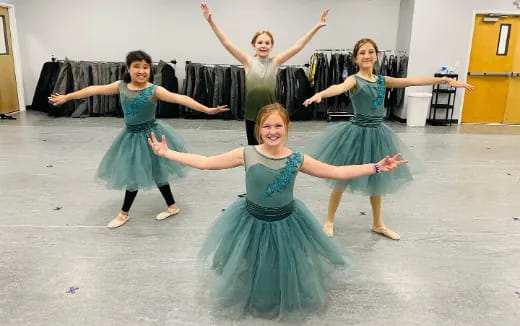 a group of girls dancing