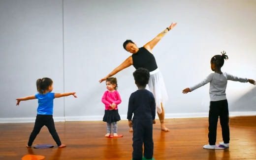 a group of children dancing