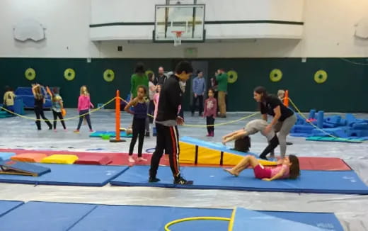 a group of people in a gym