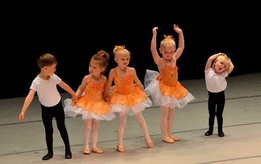 a group of children dancing