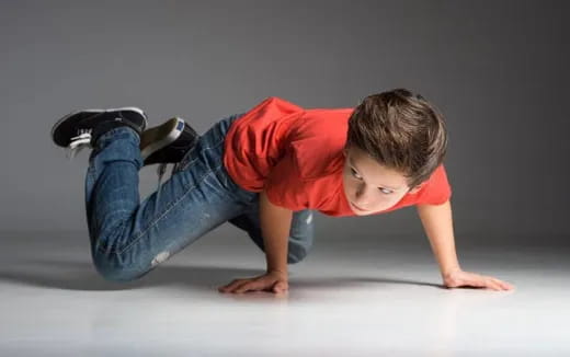 a boy lying on the floor