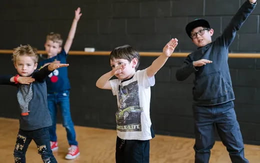 a group of kids dancing