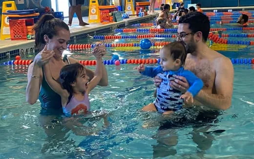 a group of people in a pool