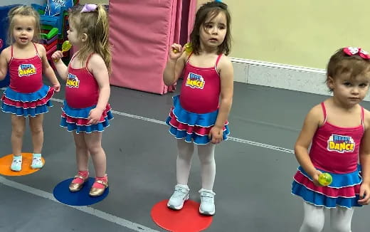 a group of girls in a gym