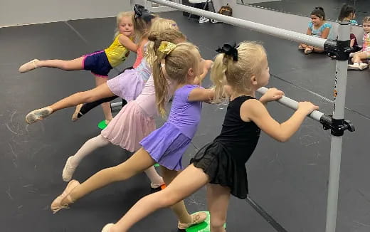 a group of girls performing gymnastics