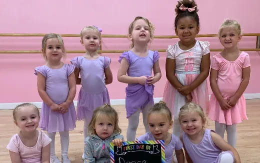 a group of girls posing for a photo