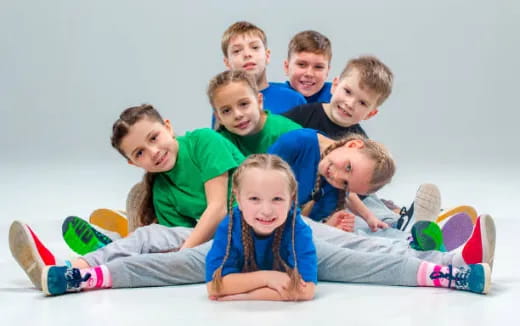 a group of children posing for a photo