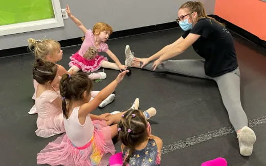 a group of people doing yoga