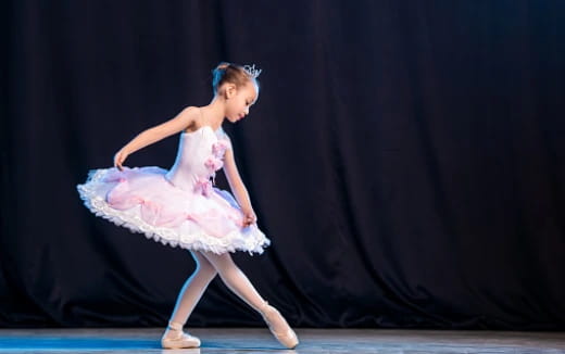a girl dancing on a stage