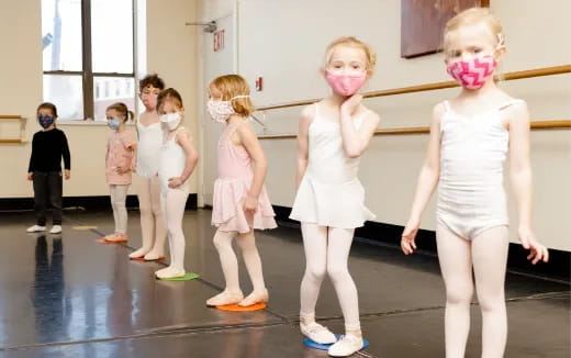 a group of children wearing clothing