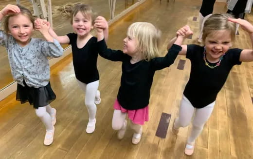 a group of girls dancing