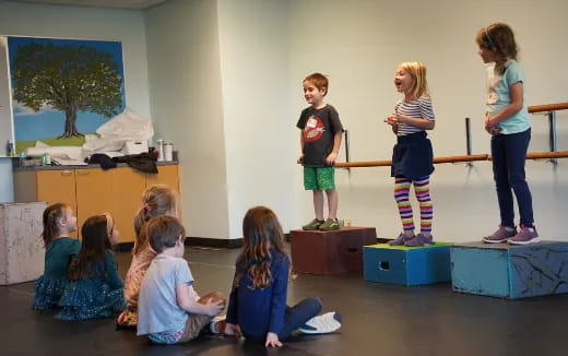 a group of children in a classroom