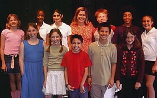 a group of people posing for a photo