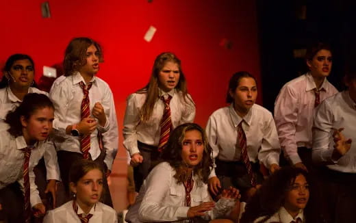 a group of people wearing ties