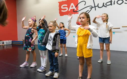 a group of children dancing