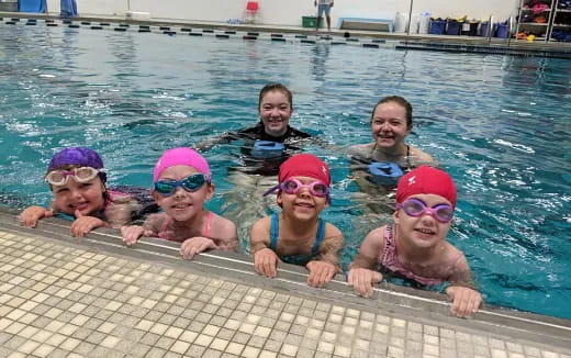 a group of people in a pool