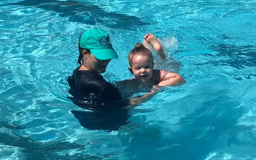 a man and a woman in a pool