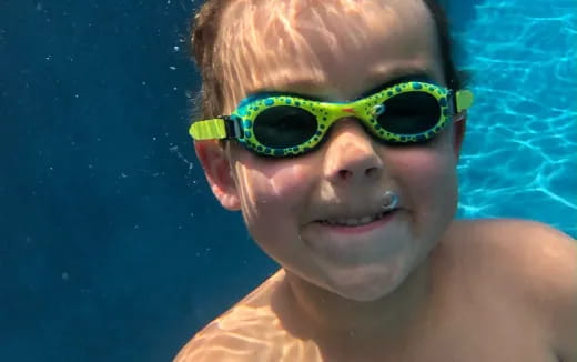 a boy wearing goggles