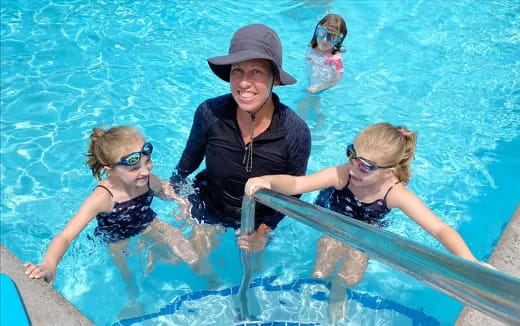 a group of people in a pool