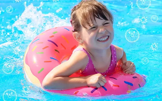 a baby in a pool