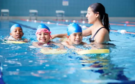 a group of people in a pool