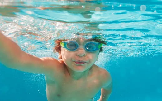 a person swimming in a pool