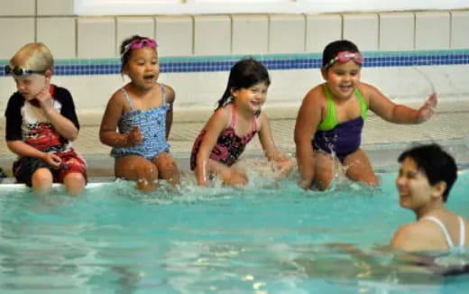 a group of people in a pool