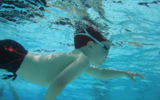 a person swimming underwater