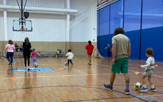 a group of people playing football