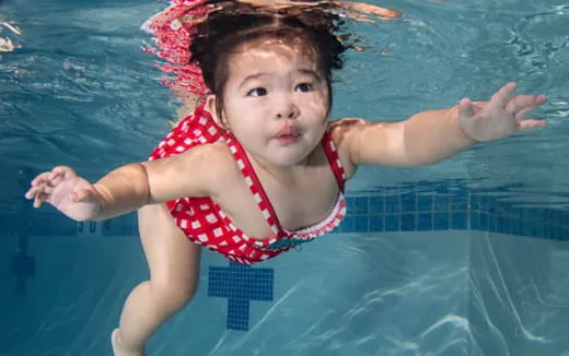 a child in a pool