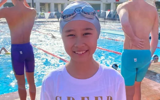 a girl in a swimming pool