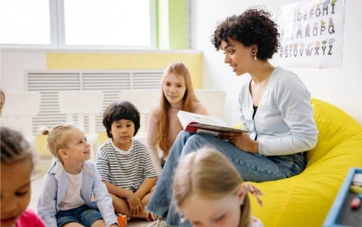 a teacher reading to her students