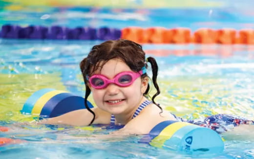 a girl in a pool