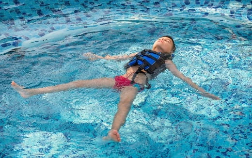a person in a pool