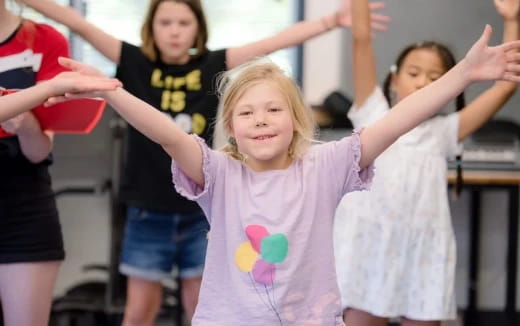 a group of children dancing