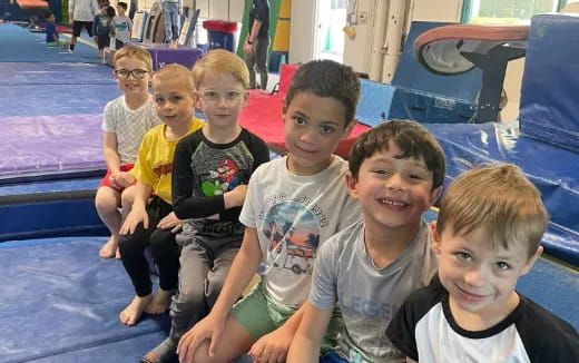 a group of children sitting on the floor