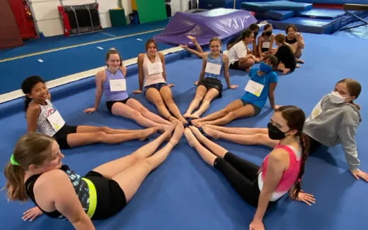 a group of people on a mat