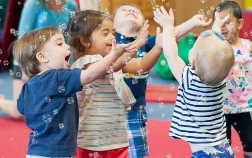 a group of children dancing