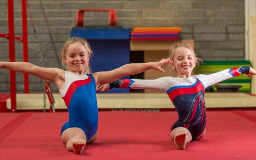 two girls in a gym