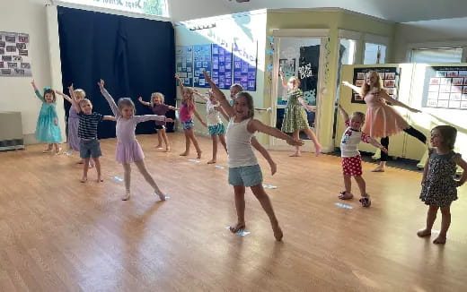 a group of children dancing