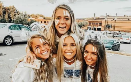 a group of women smiling