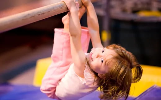 a girl doing a yoga pose