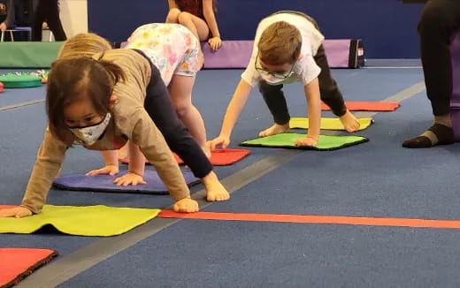 a group of people doing yoga