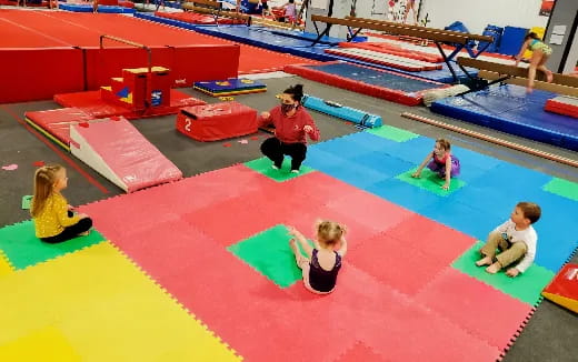 children playing on a colorful floor