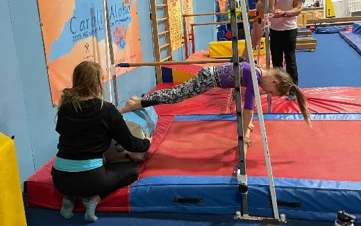 a couple of girls on a trampoline