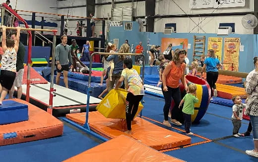 a group of people in a gym